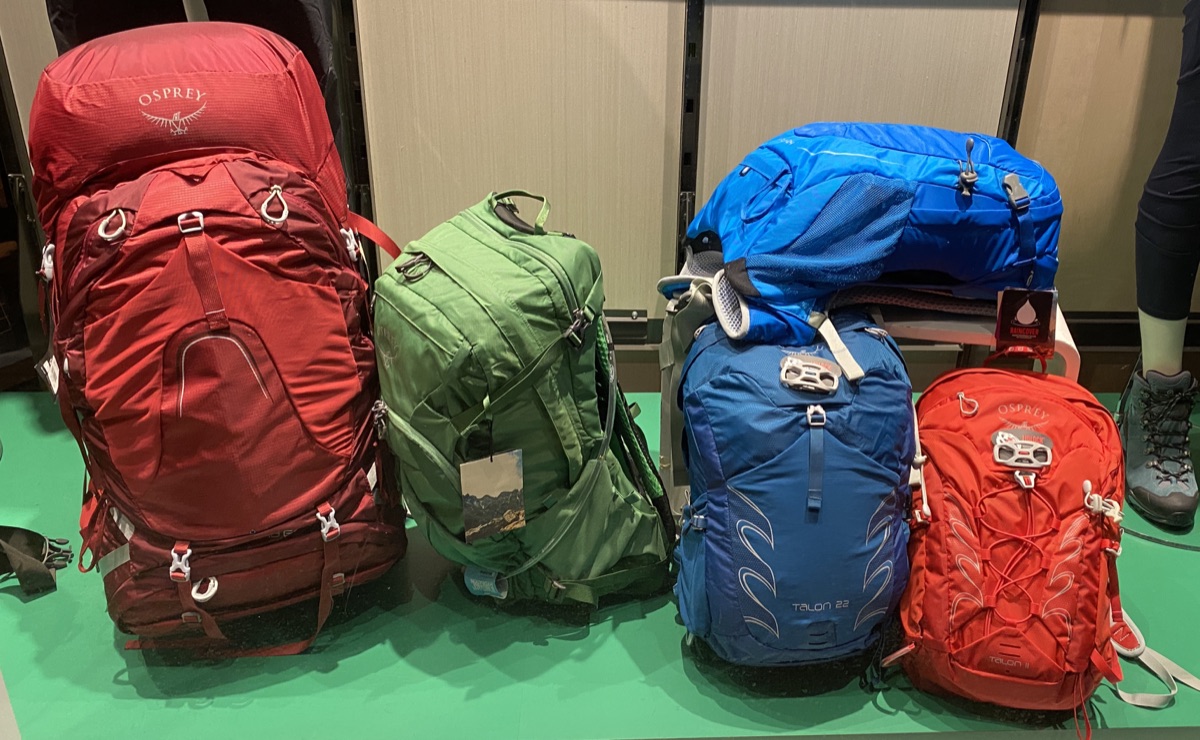 Colorful hiking backpacks in an outdoor gear shop